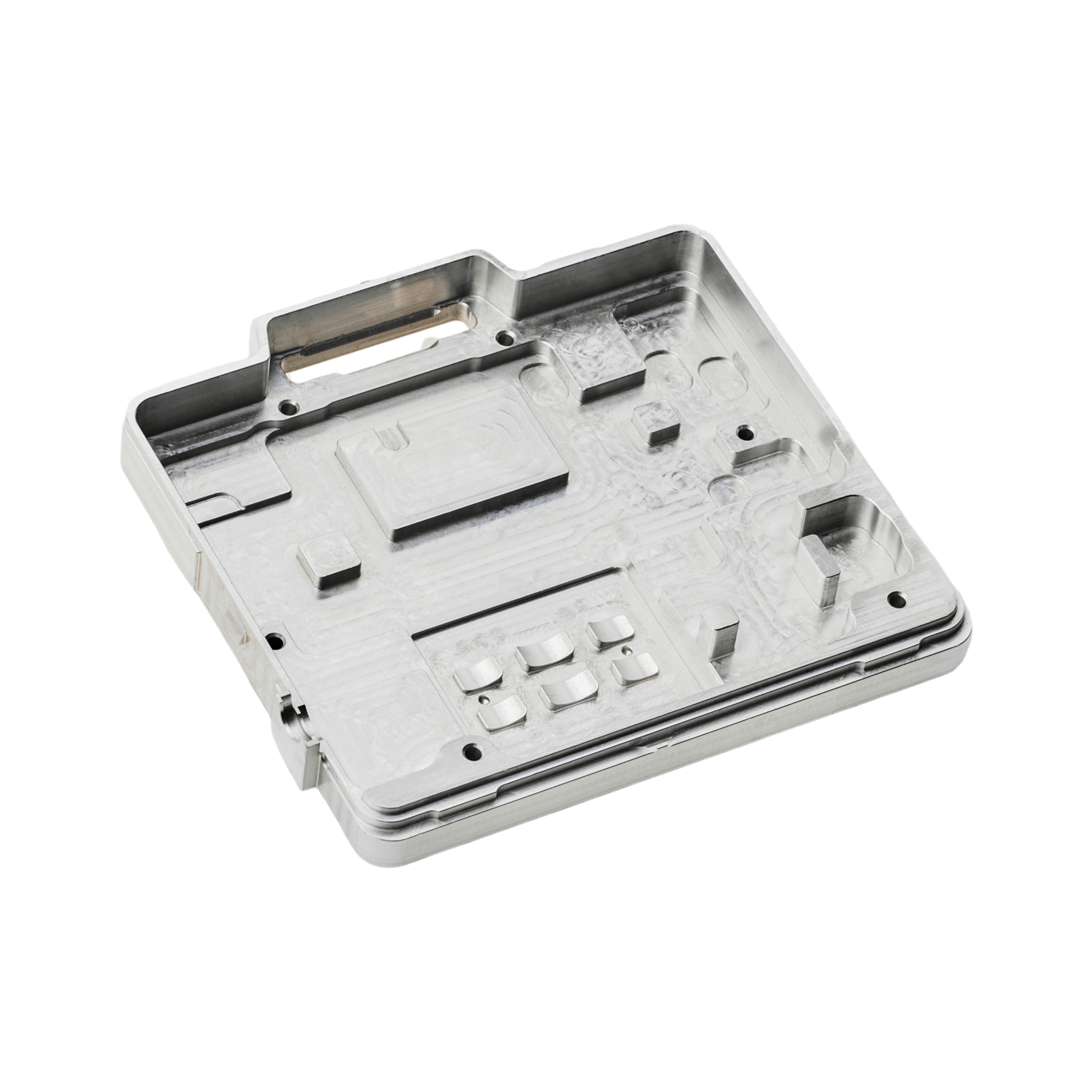 Freigestelltes, CNC-gefrästes Präzisionsbauteil aus Aluminium von hepro production ag mit komplexen Taschen, Bohrungen und fein bearbeiteter Oberfläche.