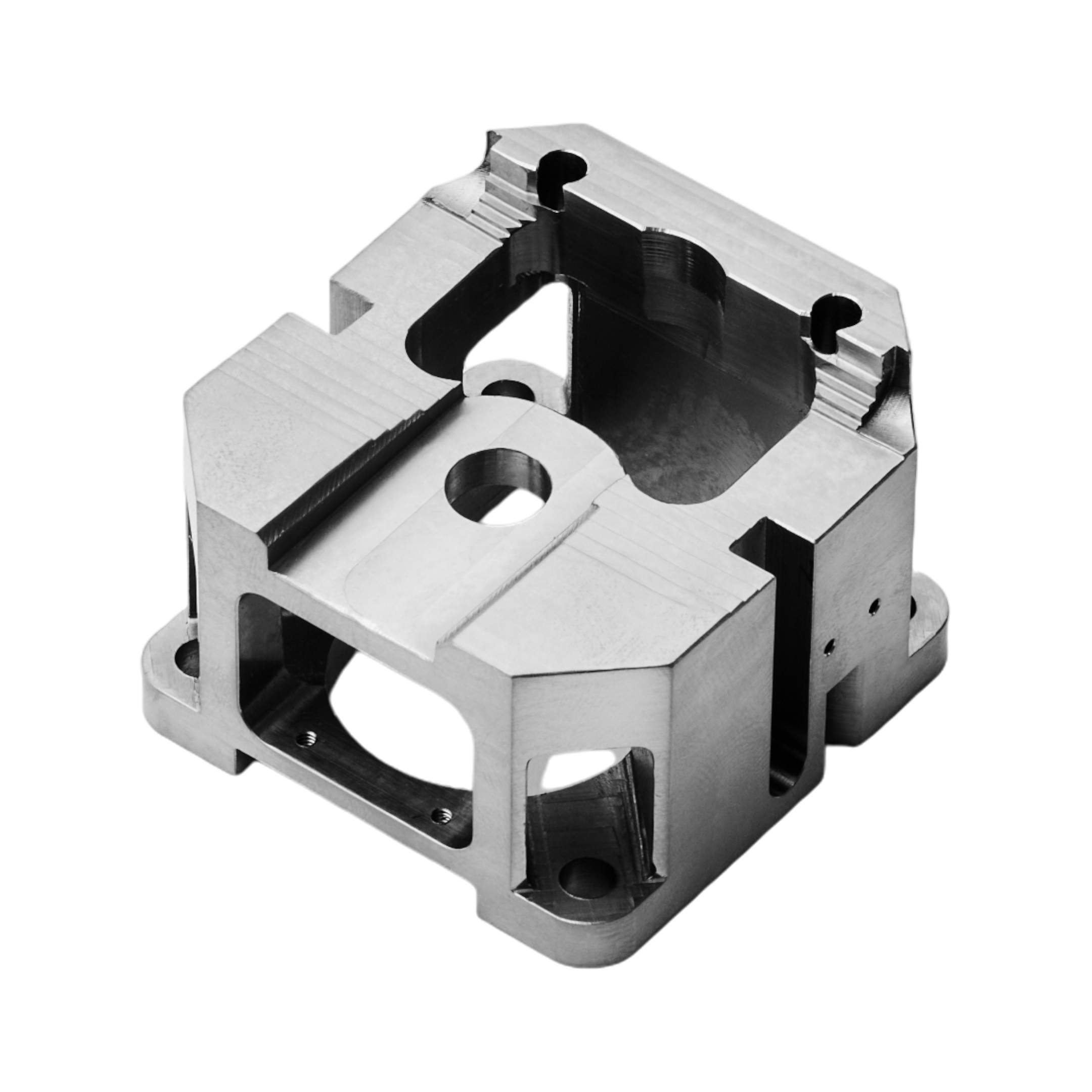 Freigestelltes, CNC-gefrästes Präzisionsbauteil aus Aluminium von hepro production ag mit komplexer Geometrie, mehreren Durchbrüchen, Bohrungen und exakt bearbeiteten Kanten.